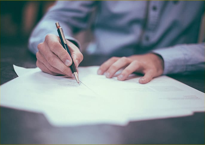 Individual filling out their forms